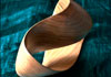 Mobius strip made from cherry wood
