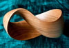 Mobius strip made from cherry wood