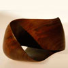 Mobius strip made from walnut wood